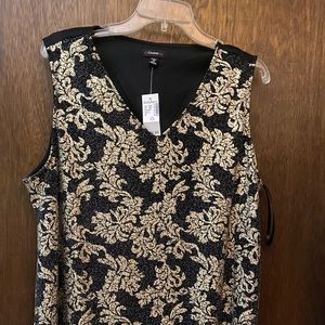 Shimmering gold design on black sleeveless shirt. New with tags.